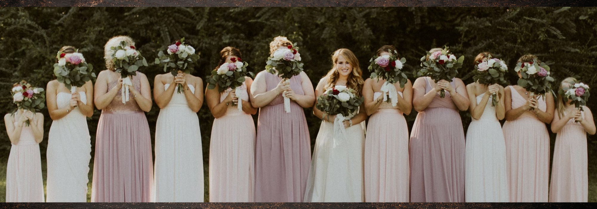 bridal party holding bouquets 